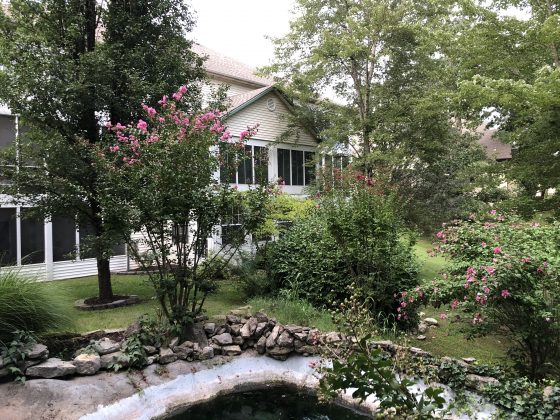 This Pointe Royale Branson condo has an relaxing and beautiful backyard.