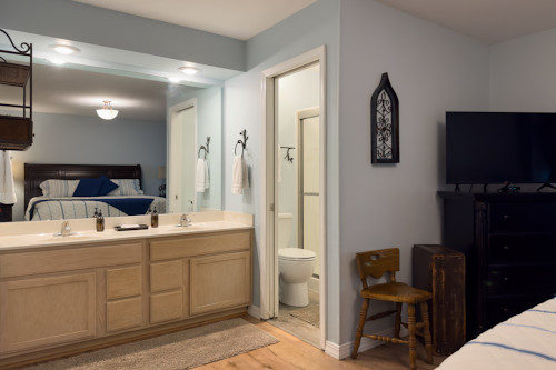 There is an attached bathroom off the master bedroom for this Pointe Royale Branson condo.