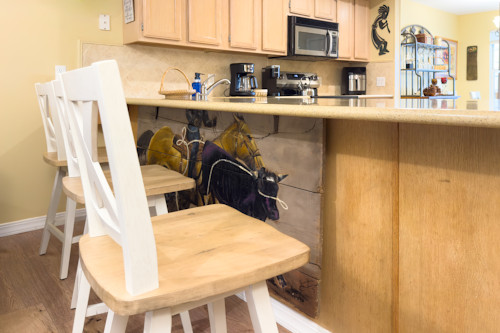 See the kitchen and counter layout for this Pointe Royale Branson condo.